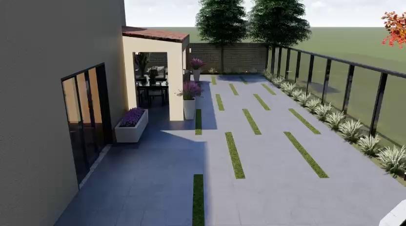 Still frame from a rendered landscape design walkthrough, showing a paved patio with grass inlays and greenery